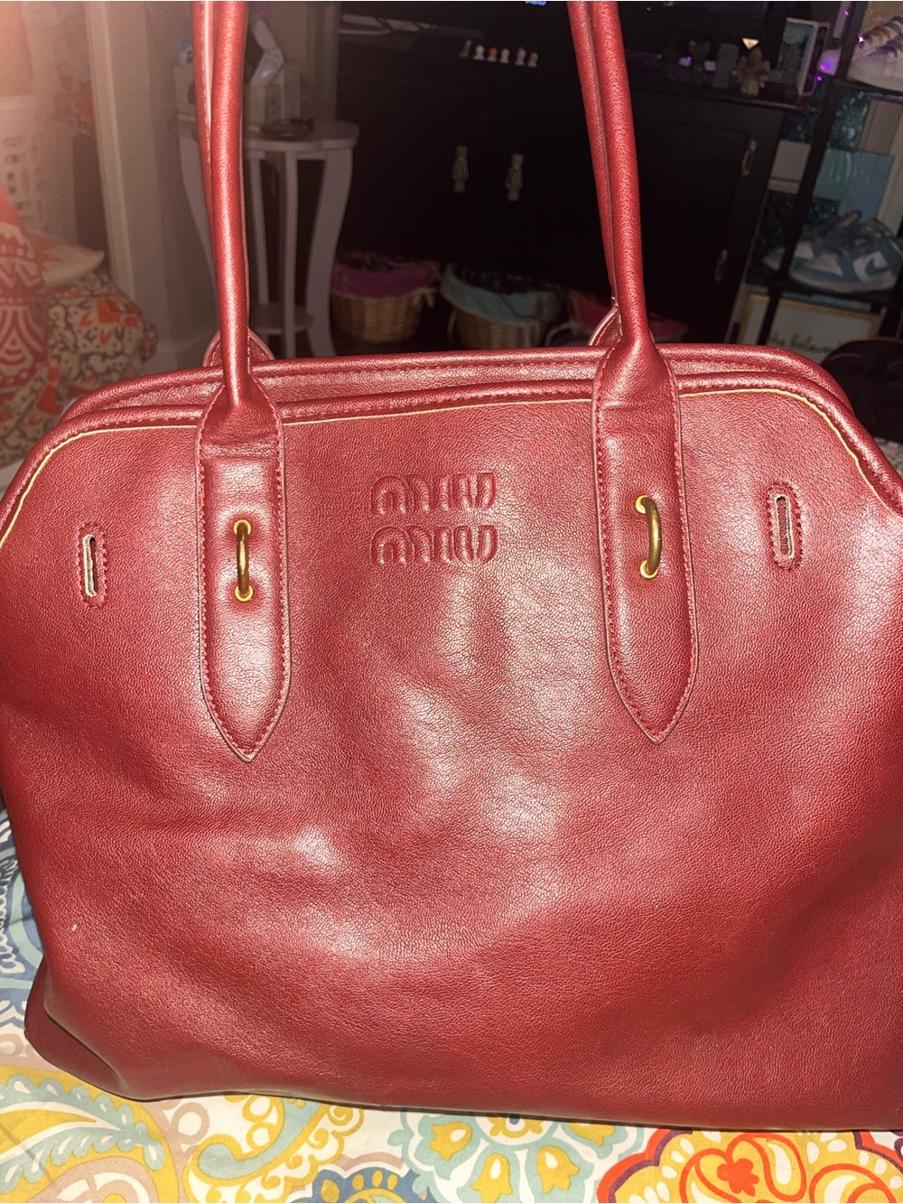 MIU MIU aventure burgundy medium sized purse needs repairs and missing belt